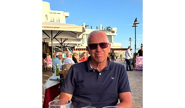 Man with sunglasses on looking at camera