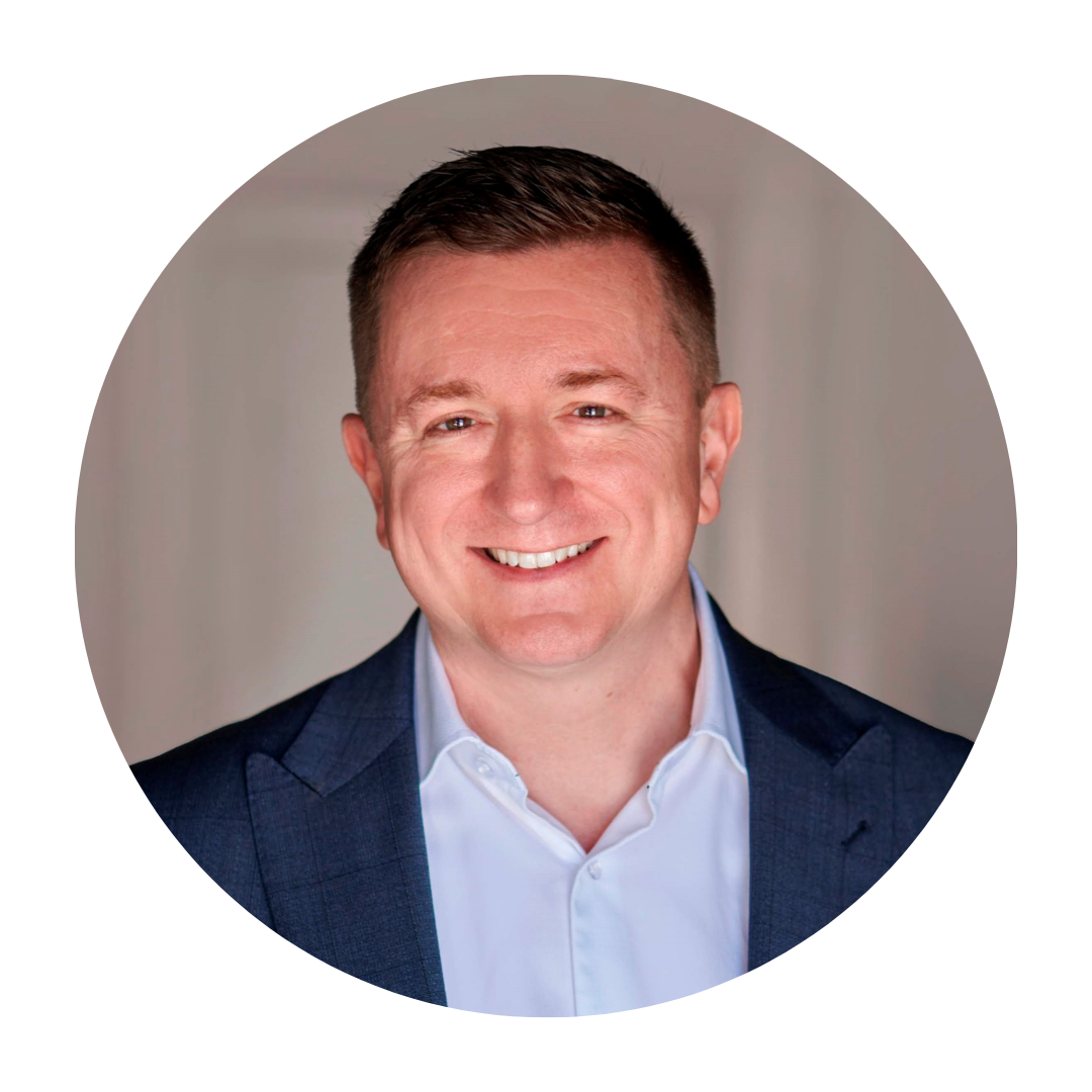 Daryll smiling at the camera.