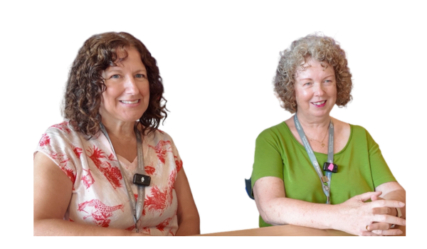 two ladies smiling 