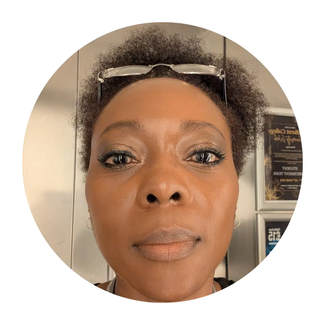 Jacqueline smiling at the camera