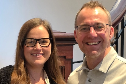 Pictured Hollie Mailey on the left smiling with colleague.