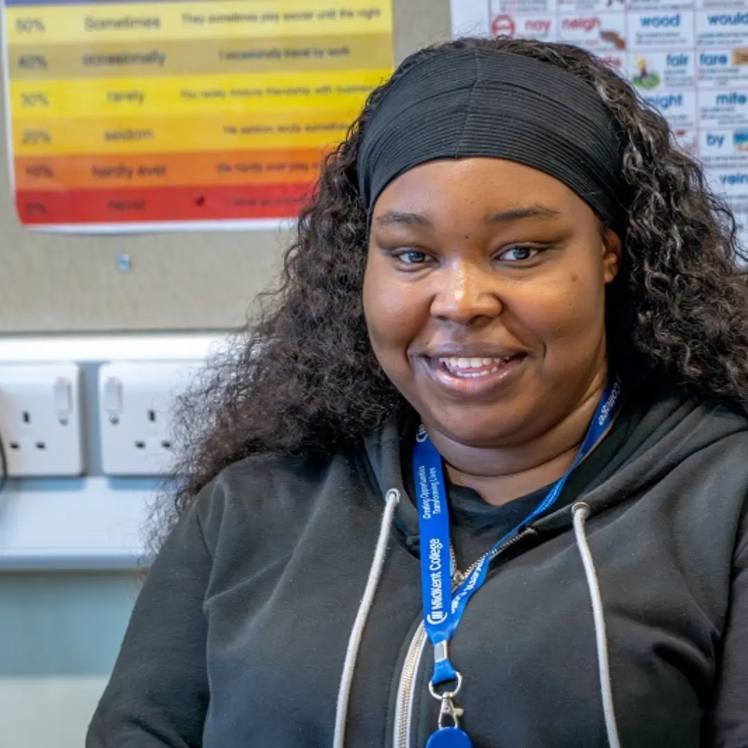 ESOL student smiling at the camera