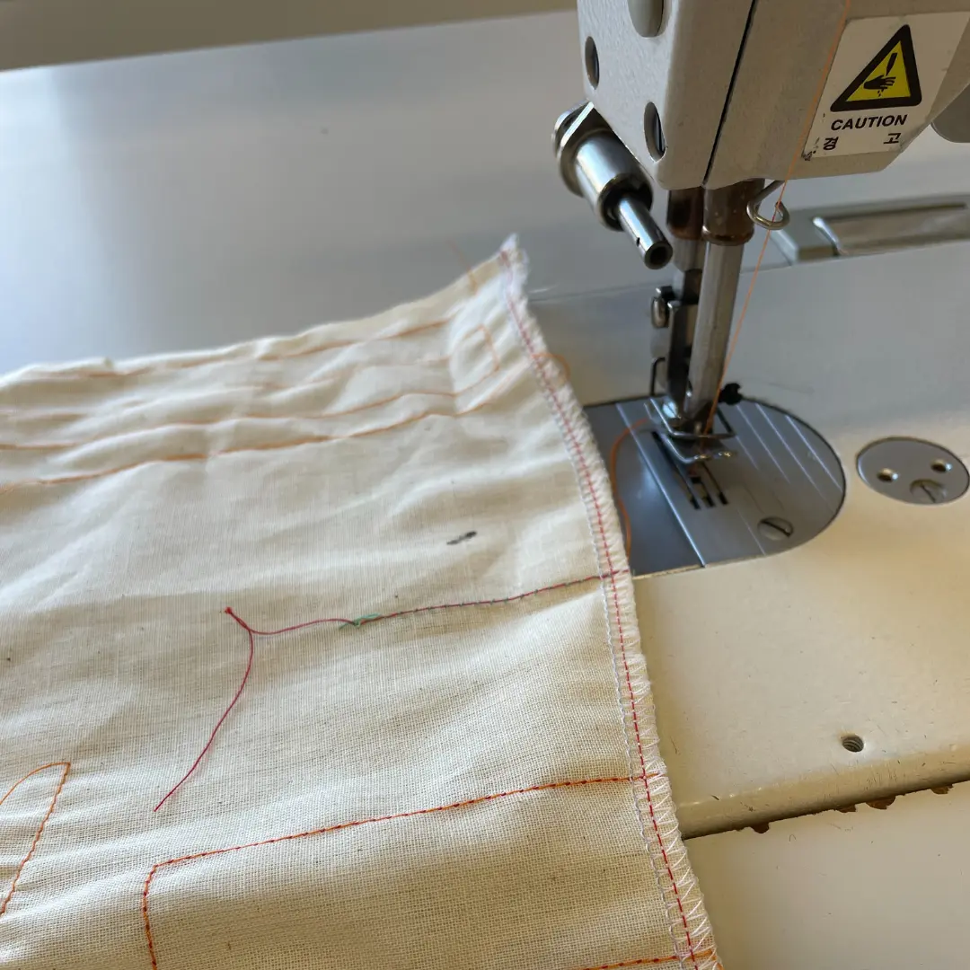 Sewing machine and fabric