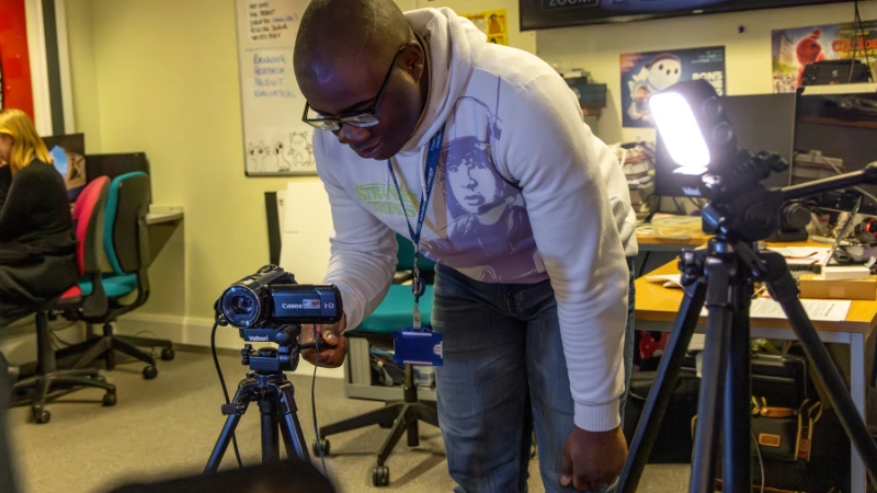 Student using video equipment
