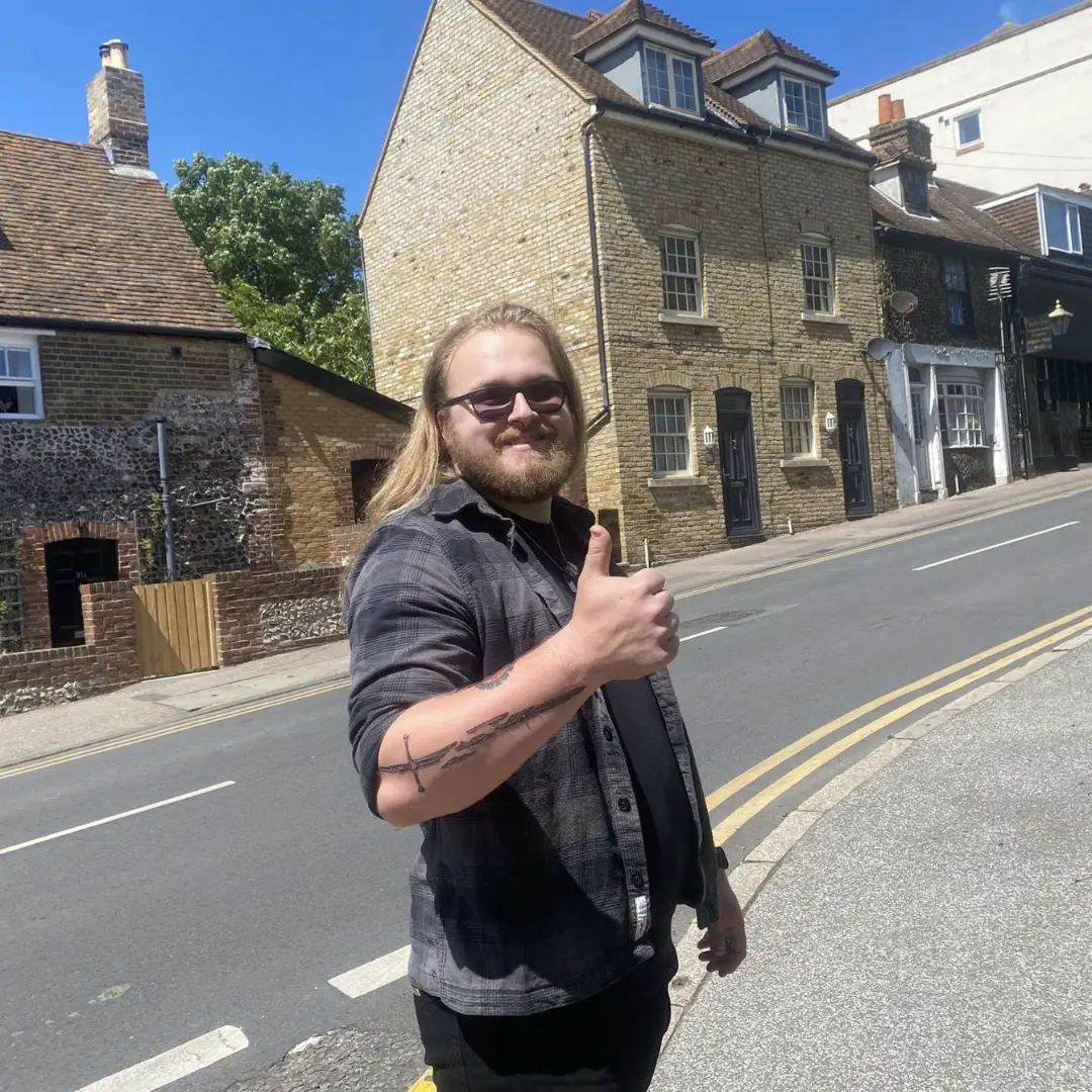 Chris doing a thumbs up to the camera