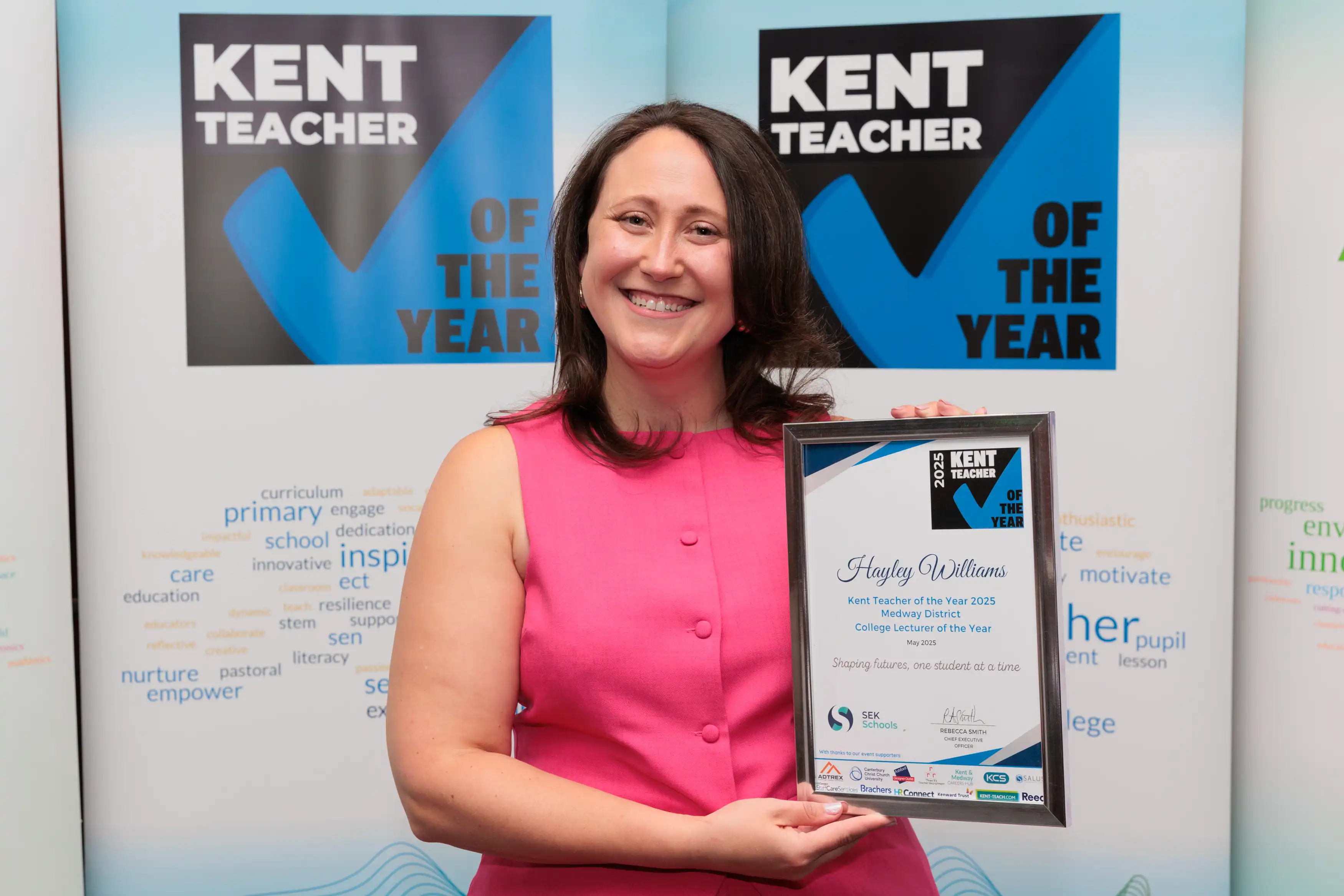 Hayley Williams accepting her certificate for winning Kent College Lecturer of the Year 2024