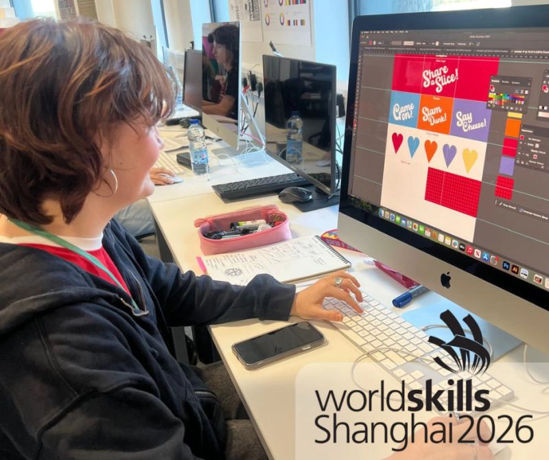 Lara at her mac designing her competition entry