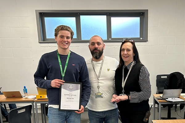 Pictured, Jack on the left, Chris Dolan ( Carpentry Apprentice Trainer) middle and Jane Burtenshaw (Director) on the right.