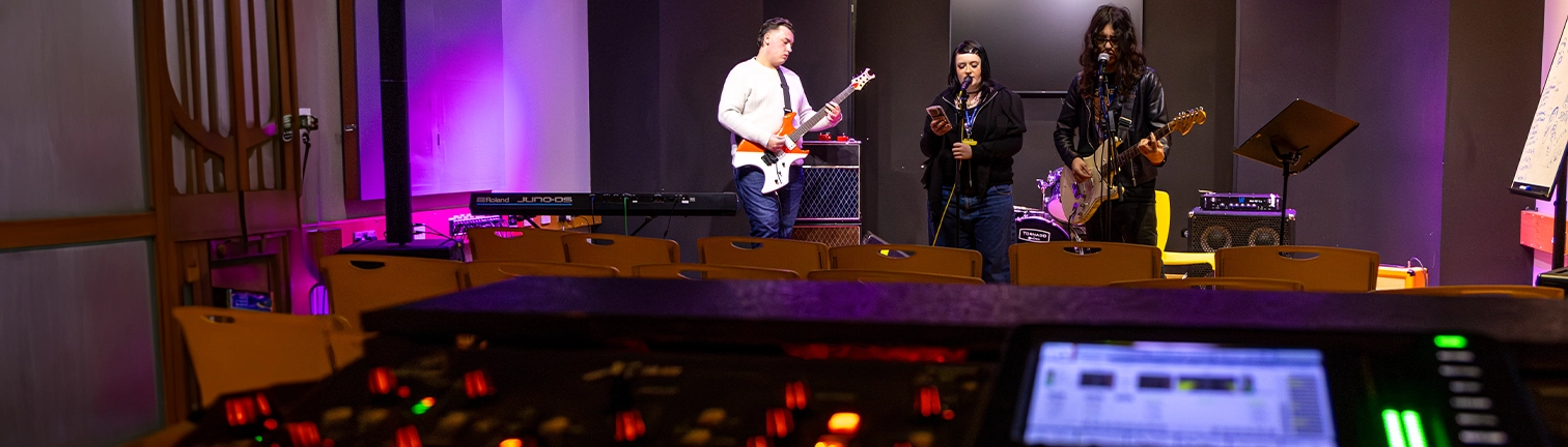 Students performing in music studio