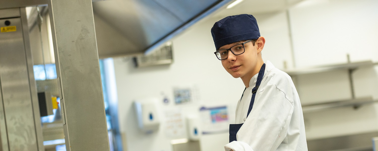 Hospitality student smiling at the camera