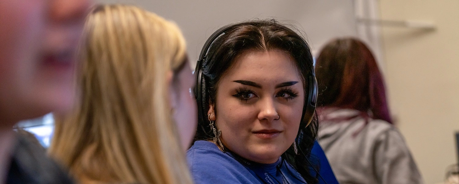 Students looking at each other in class