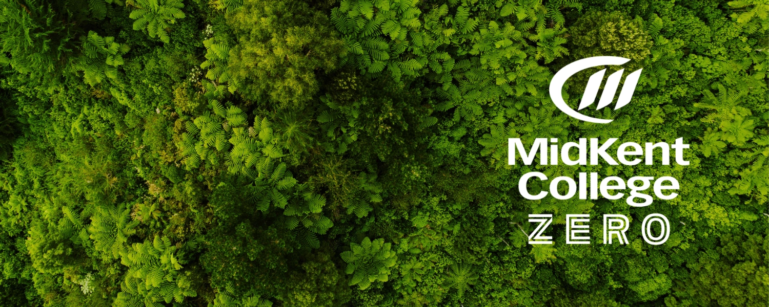 MidKent College Zero logo on top of green shrubbery