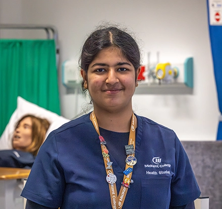 Pictured Aiman, smiling in College hospital room.