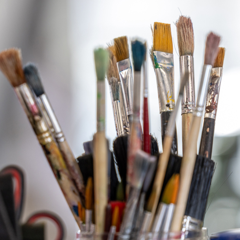 Paintbrushes in a cup