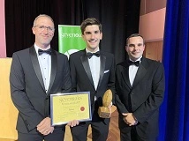Student receiving award