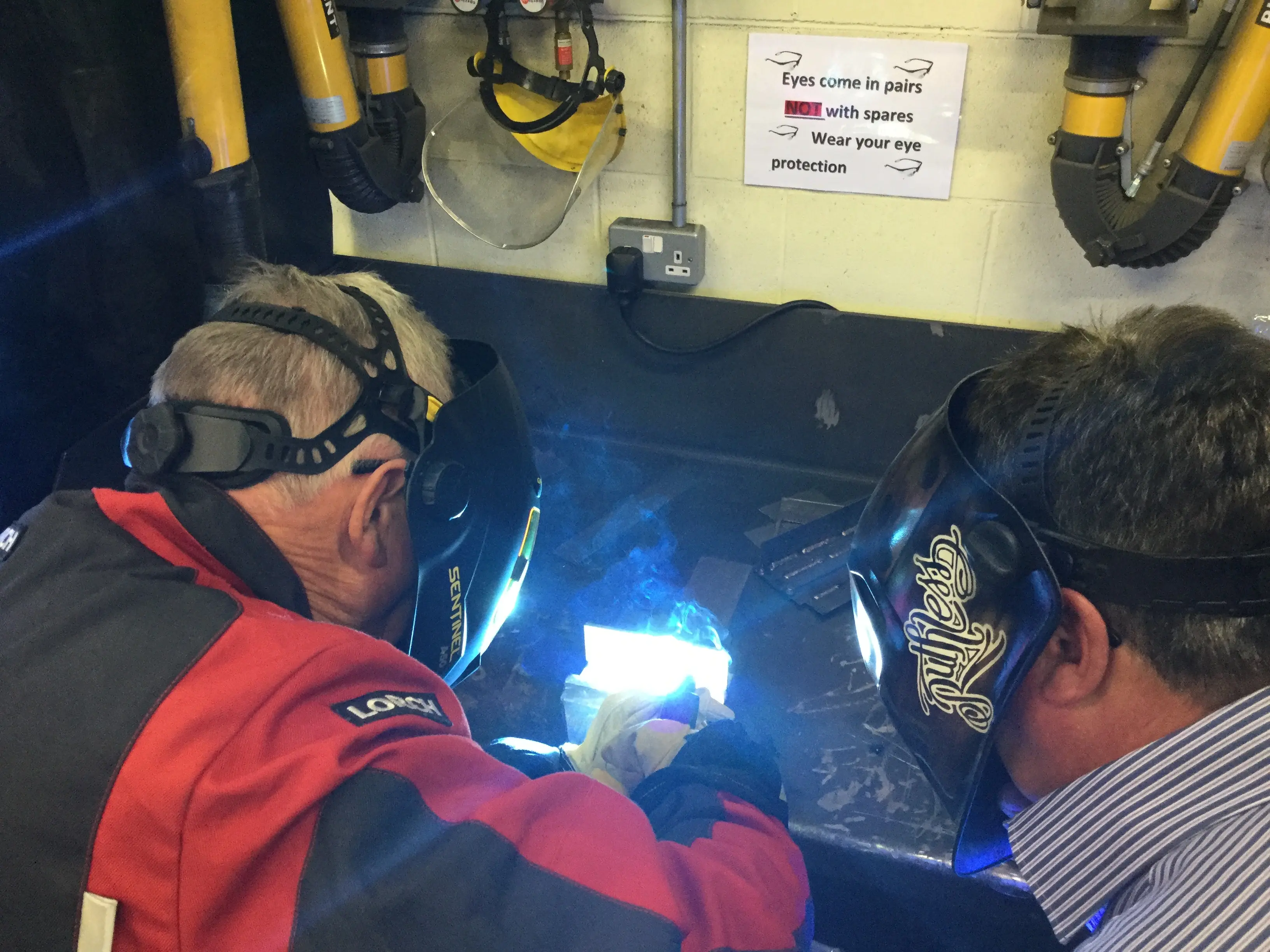Students using welders