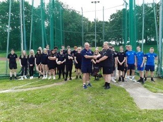 group photo of students involved with rugby tag game