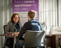 Joanne with a student