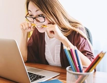 A person uses a laptop